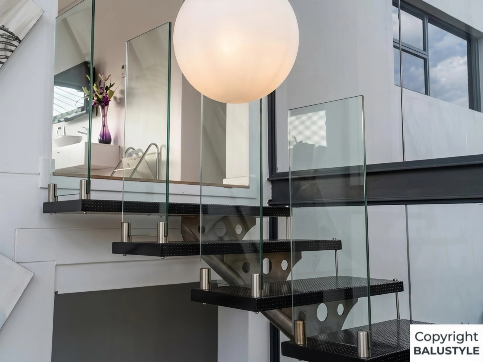 Frameless 12mm glass balustrade on a terrace edge